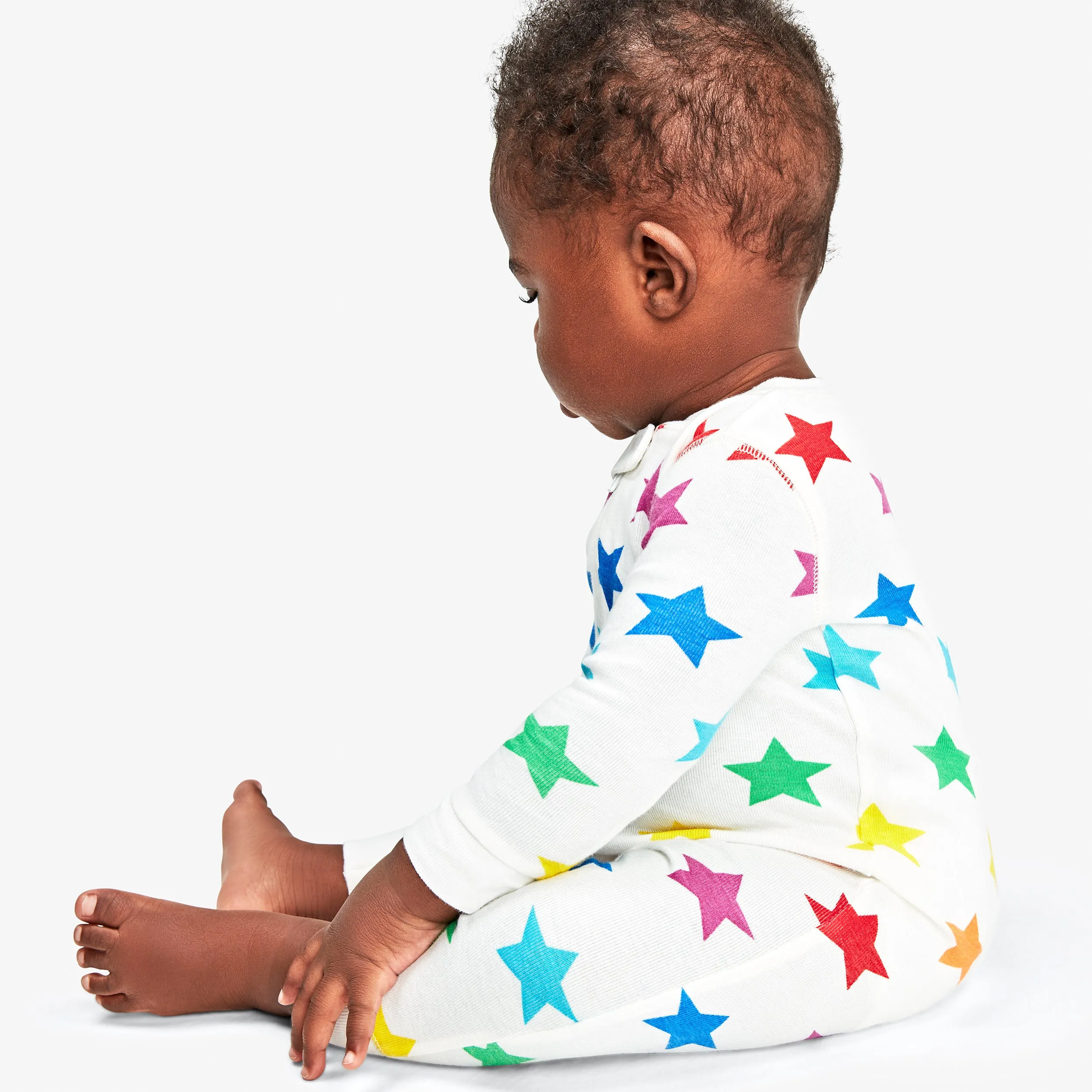 Clearance baby organic zip romper in bright rainbow stars